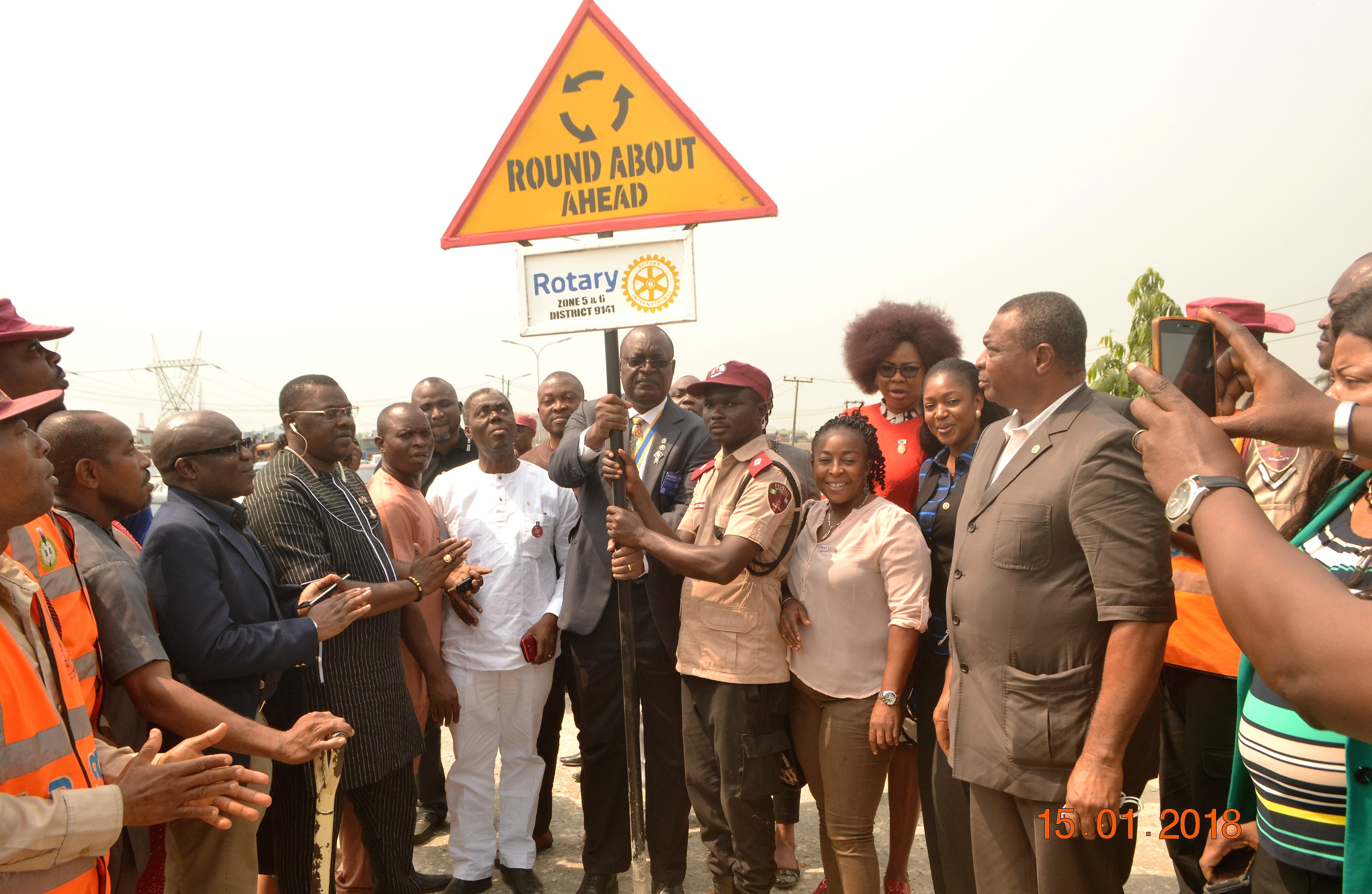 Rotary District Governor Commissions Road signs in Delta