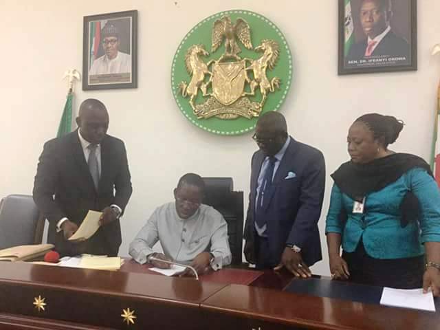 Okowa signs five bills into law