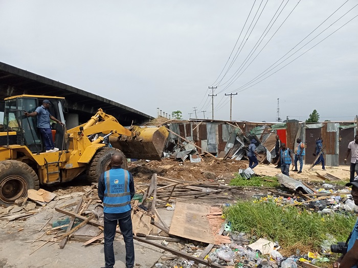 Shanties, caravans brought down as Warri South, State Taskforces begin demolition in Warri