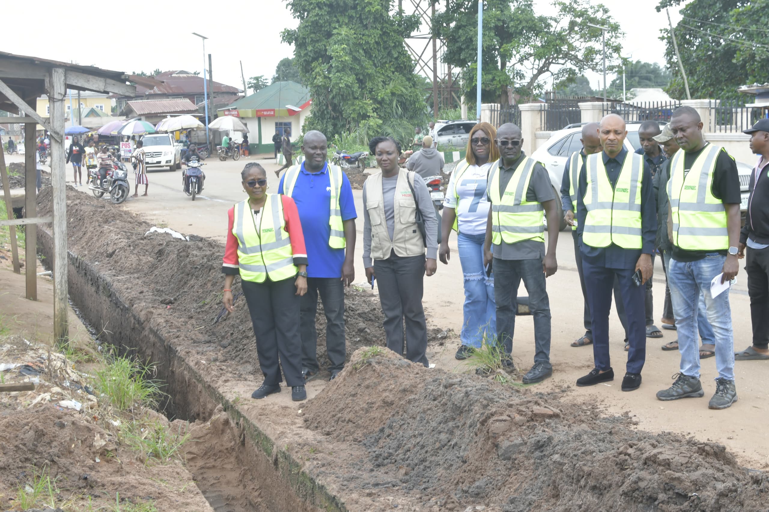 To Avert Flooding, DESOPADEC extends De - Silting Of Draineges To Ika Nation